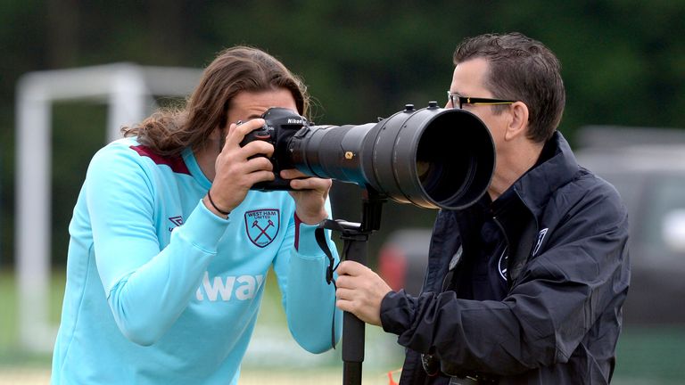 West Ham striker Carroll turns cameraman at training
