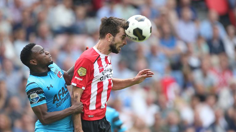 PSV's Davy Propper wins a header against AZ Alkmaar
