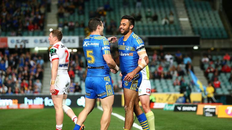 Bevan French of the Eels celebrates a try against the Dragons
