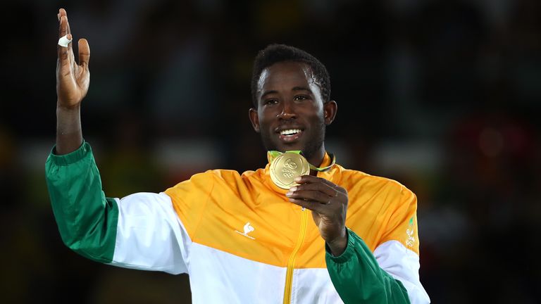 Cheick Sallah Cisse celebrates his country's first gold medal