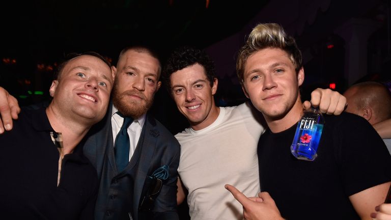 McGregor pictured post-fight with Irish compatriots Rory McIlroy and Niall Horan