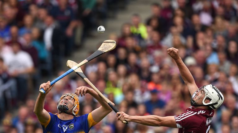Séamus Callanan of Tipperary in action against Daithí Burke of Galway