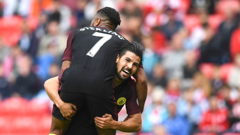 Nolito (R) celebrates his goal with team-mate Raheem Sterling