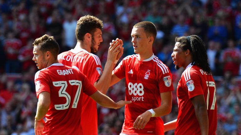 Thomas Lam celebrates after scoring