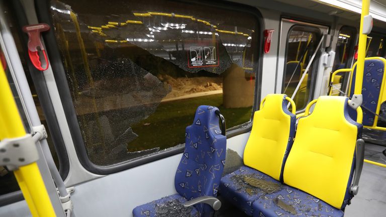 Officials do not know whether the windows on the bus were broken by bullets or stones