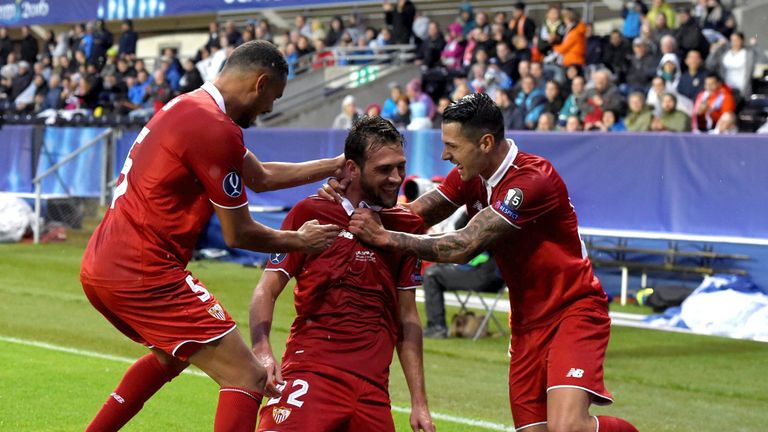 Vazquez celebrates his goal for Sevilla, their first of the match