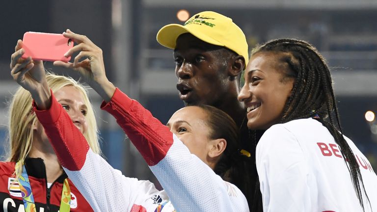 Bolt found time to pose with Jessica Ennis-Hill and the heptathlon medallists after his third Olympic 100m title