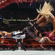 Charlotte, Bayley and Sasha Banks perform simultaneous dropkicks