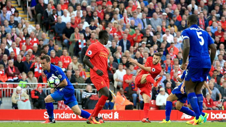 Adam Lallana scores Liverpool's third goal of the game at Anfield
