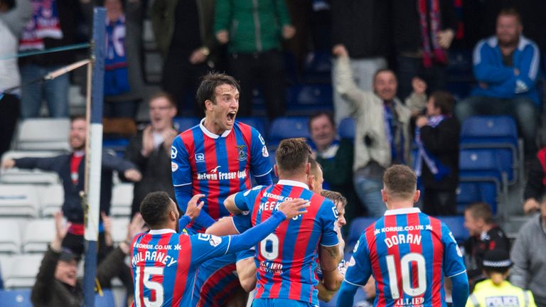 Inverness Caley Thistle's Alex Fisher (hidden) celebrates his goal against Celtic