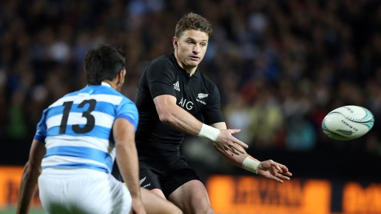 New Zealand's flyhalf Beauden Barrett passes the ball