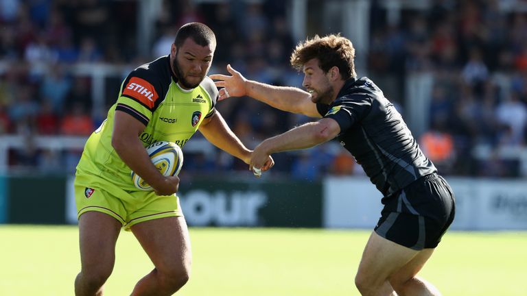 Ellis Genge of Leicester is tackled by Dominic Waldouck 