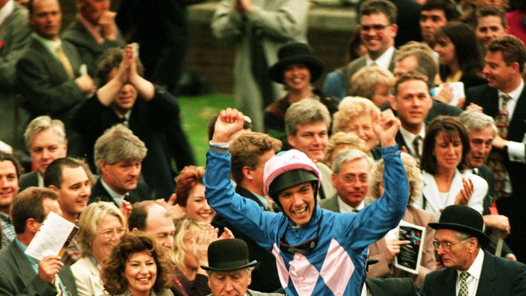 Frankie Dettori celebrates after completing his 'magnificent seven' on Fujiyama Crest in the Gordon Carter Stakes