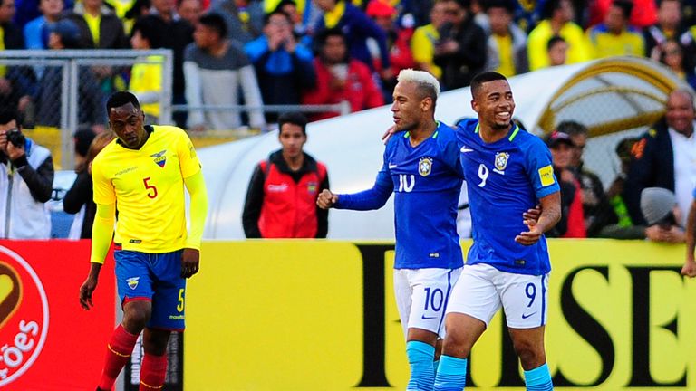 Jesus (r) celebrates with Neymar Jr (c) after scoring against Ecuador