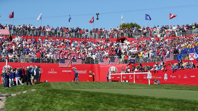 Danny Willett hits off the first tee to a chorus of boos