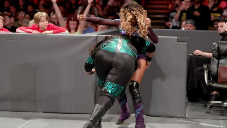 Nia Jax speared Alicia Fox through the barricade