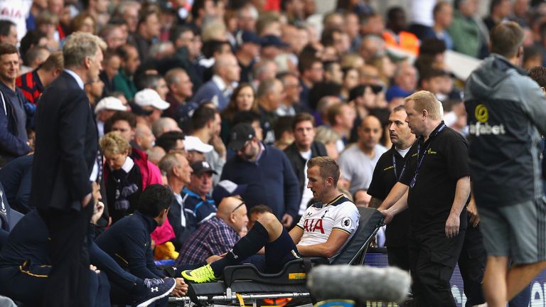Harry Kane is stretched off late on at White Hart Lane