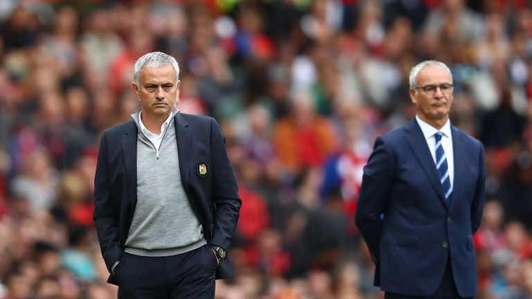Jose Mourinho and Claudio Ranieri look on at Old Trafford