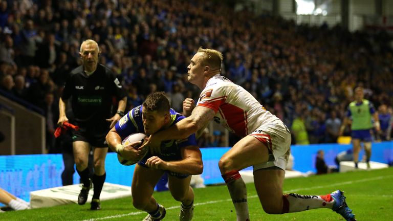 Tom Lineham dives over the line to score