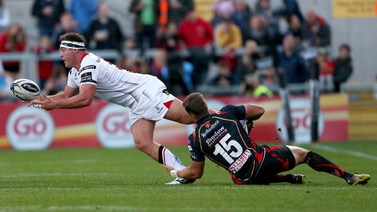 Rob Herring is tackled by Carl Meyer of the Dragons