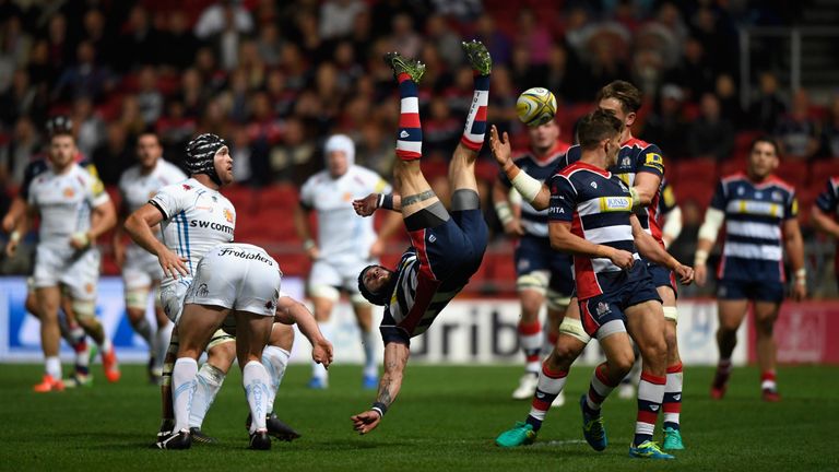 Exeter wing Ian Whitten (left) tackles Ryan Edwards in the air and is sin-binned