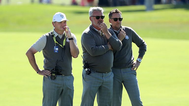 Concerned faces on Clarke, Poulter and Paul Lawrie as the USA dominated the fourballs