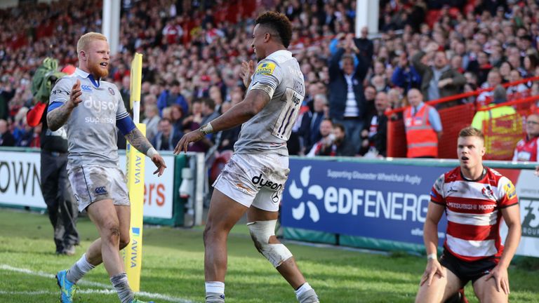 Anthony Watson celebrates with Tom Homer (left) after scoring Bath's first try at Kingsholm