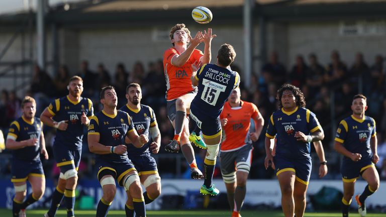 Simon Hammersley competes for a high ball with Jamie Shillcock