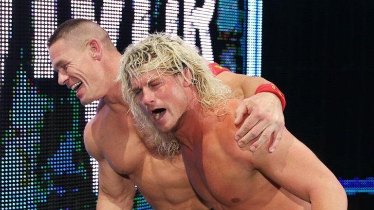 Cena helps Ziggler to the back after his Survivor Series triumph.