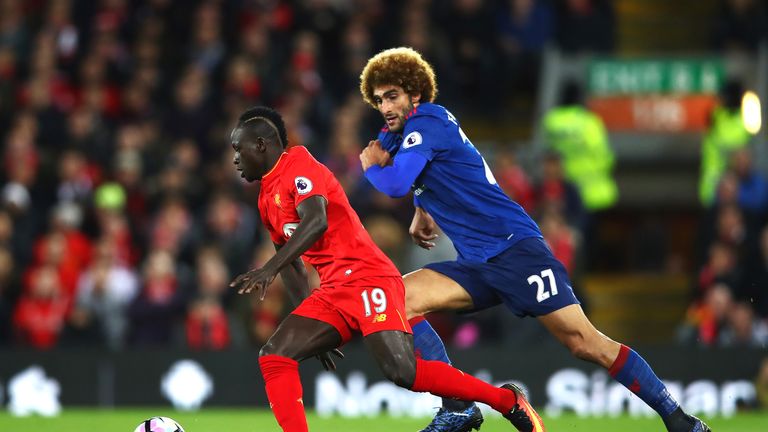 Sadio Mane takes on Marouane Fellaini in the first half