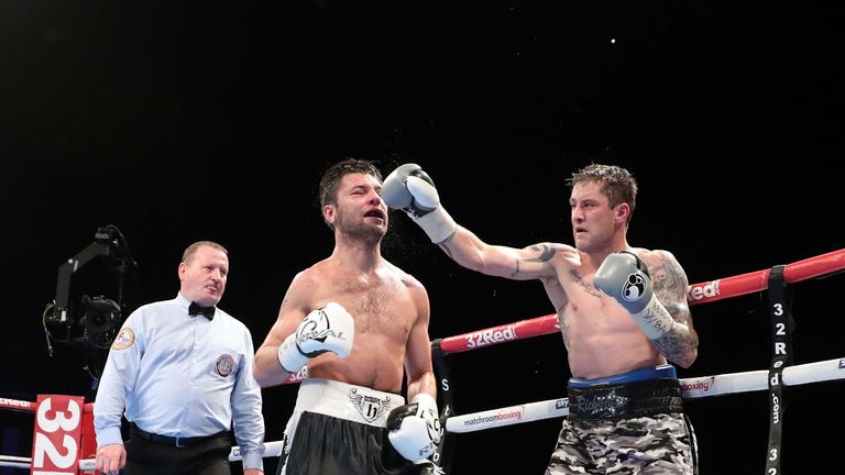 Burns catches Relikh with a right hook