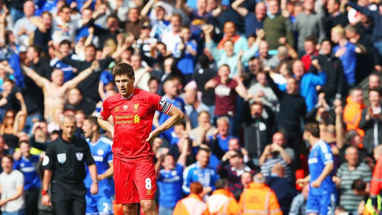 Gerrard looks dejected as his mistake hands Chelsea a crucial goal at Anfield in April 2014