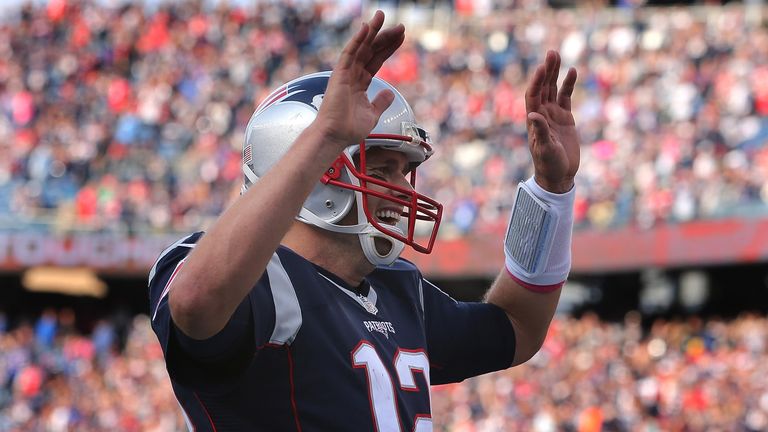 Tom Brady again led New England to the top seed in the AFC