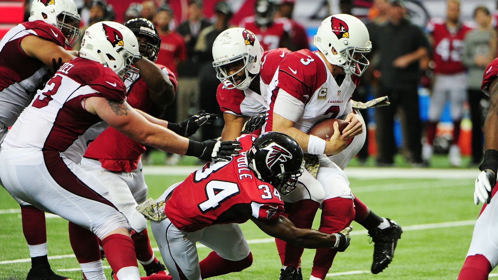 Cardinals beat Falcons after Bryant's extra point miss