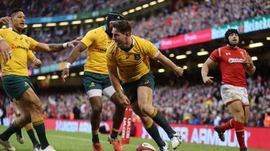 Bernard Foley celebrates after scoring a try against Wales 