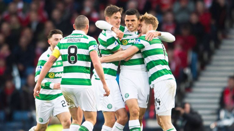 Celtic players celebrate the opening goal at Hampden from Tom Rogic