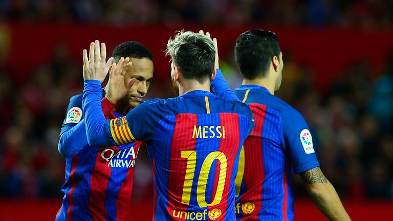 Barcelona moved to within two points of La Liga leaders Real Madrid after coming from behind to beat Sevilla