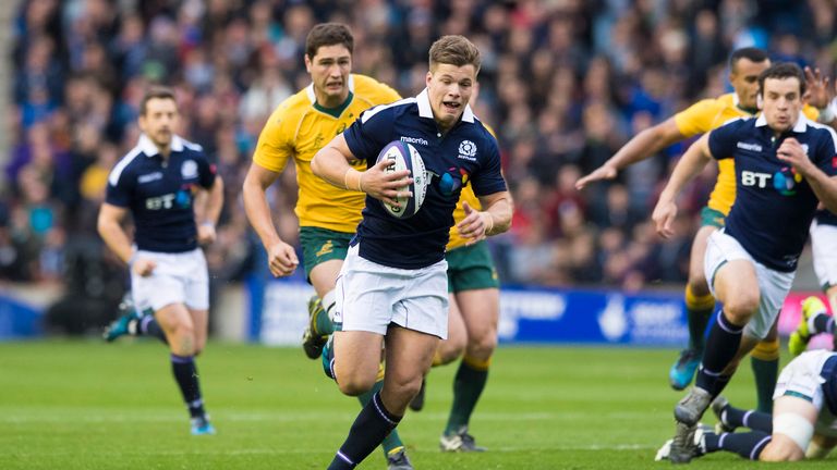 Huw Jones runs through to score his first of two tries