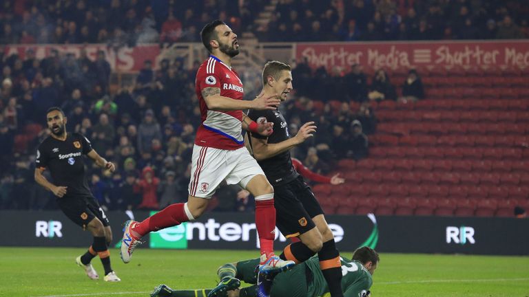 Hull goalkeeper David Marshall saves a shot from striker Alvaro Negredo