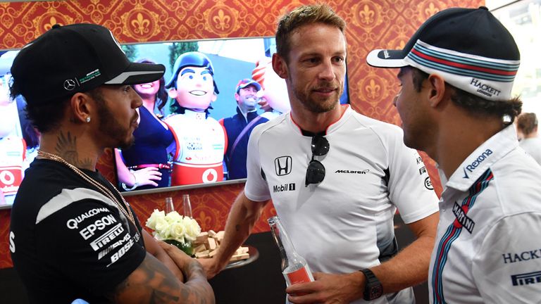 Lewis Hamilton, Jenson Button and Felipe Massa at 'The Dog and Button', the specially-made 'pub' at McLaren for JB's 300th race - Picture from Sutton Image