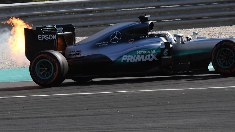 That sinking feeling: Lewis Hamilton's Mercedes bursts into flames when leading the Malaysia GP - Picture from Getty Images