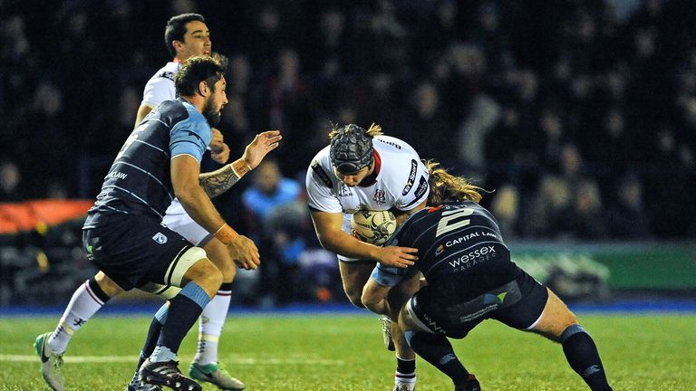 Ulster's Kyle McCall is tackled by Cardiff Blues' Kristian Dacey