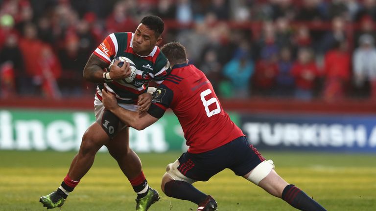 Manu Tuilagi is tackled by Peter O'Mahony