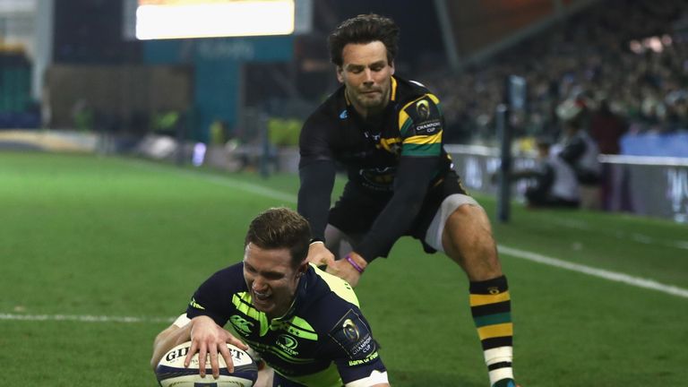 Rory O'Loughlin beats Ben Foden to the high ball to get the third score for Leinster