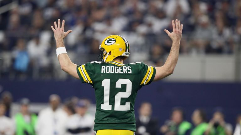 Green Bay Packers quarterback Aaron Rodgers celebrates another touchdown