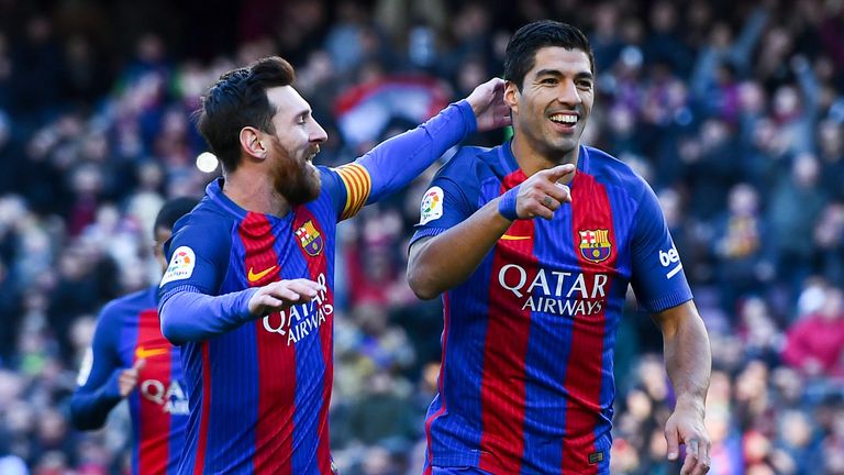Lionel Messi (L) currently leads the Golden Shoe race, while Luis Suarez claimed the award last year after scoring 40 league goals