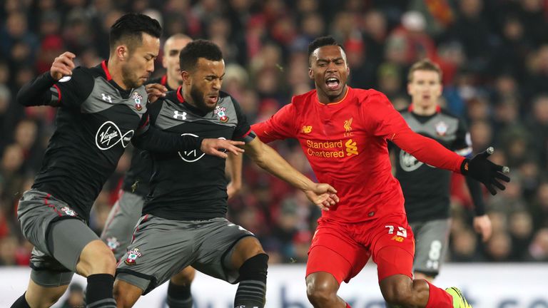 Ryan Bertrand challenges Daniel Sturridge of Liverpool