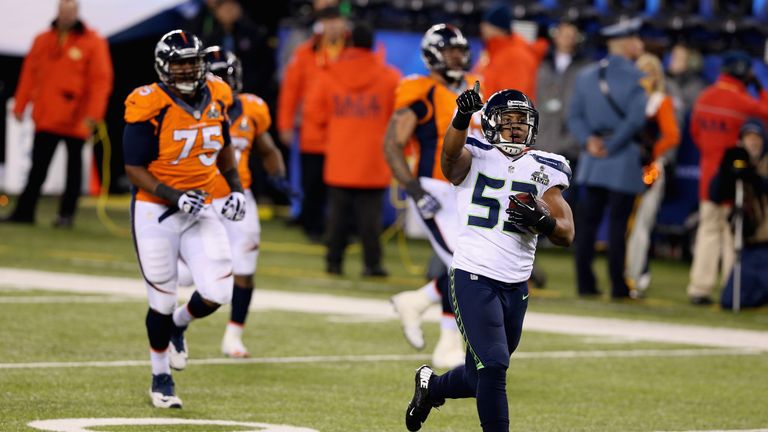 Outside linebacker Malcolm Smith intercepted Manning's pass, returning the ball 69 yards for a touchdown