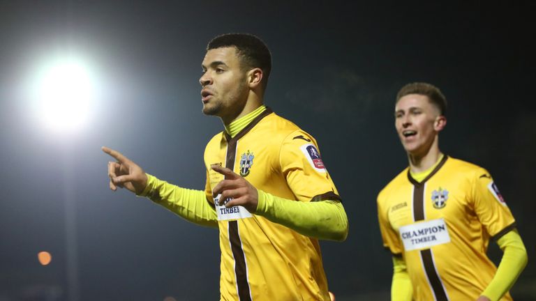 Maxime Biamou of Sutton United celebrates scoring his side's second goal