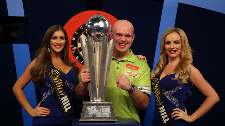Michael van Gerwen celebrates with the Sid Waddell trophy